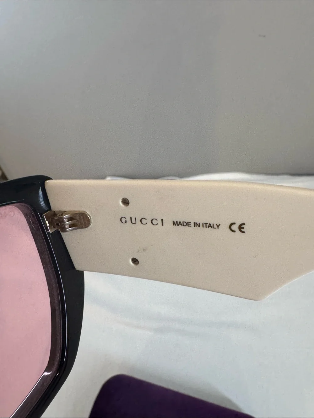 Gucci Women’s Black Frame Sunglasses with Purple Lenses and Purple Case